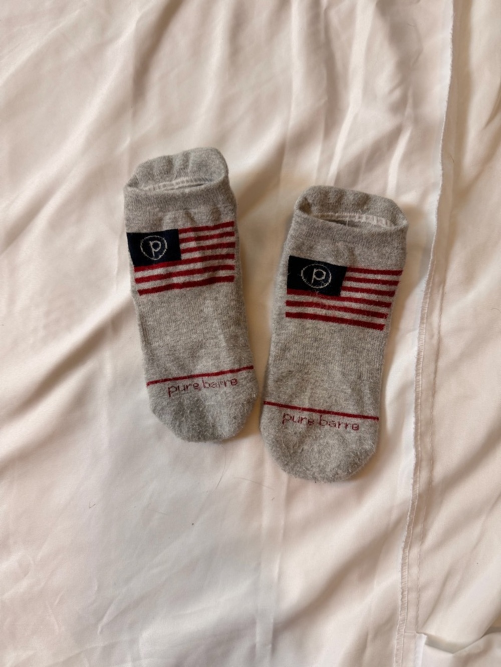 Pure Barre Gray Low-Cut Socks with Red Stripes and Navy Patch